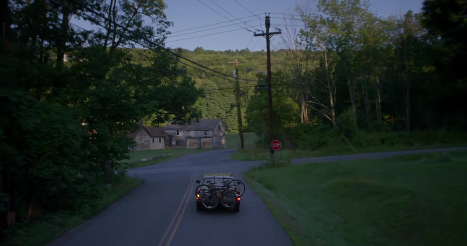 Car driving down a country road