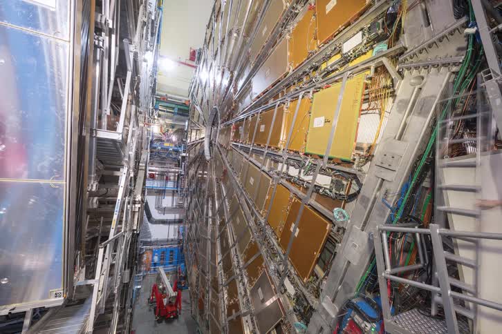 Time-lapse of scientists and engineers performing maintenance on a massive particle detector at the Large Hadron Collider