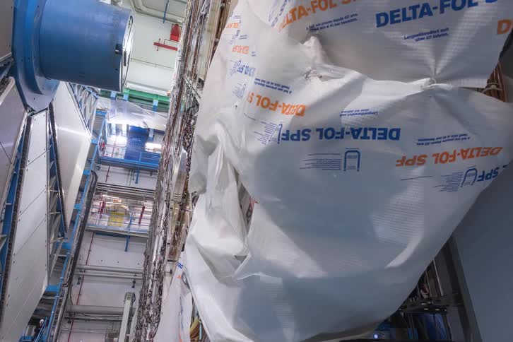 A motion-controlled time-lapse reveals the intricate details of a massive particle detector undergoing maintenance at a scientific research facility
