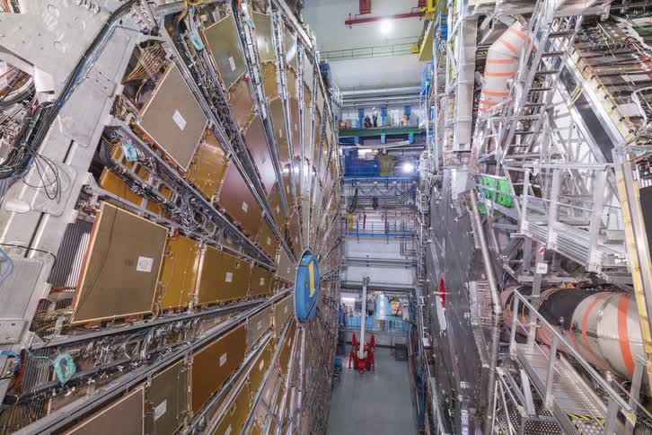 A monumental time-lapse shows the massive ATLAS particle detector at CERN's Large Hadron Collider opening for maintenance, revealing its intricate interior