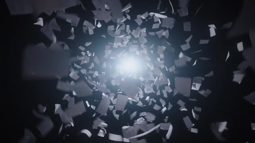 An abstract animation of countless papers flying chaotically in a dark tunnel toward a bright light