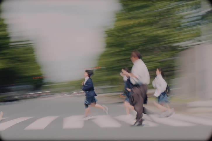 A dreamlike, motion-blurred journey through Tokyo, featuring modern skyscrapers, pedestrians rushing across a crosswalk, and reflections in a moving car