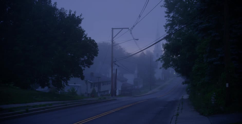 The street in this town has heavy fog