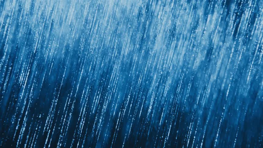 Streams of vibrant blue water fall like heavy rain in a moody, abstract close-up