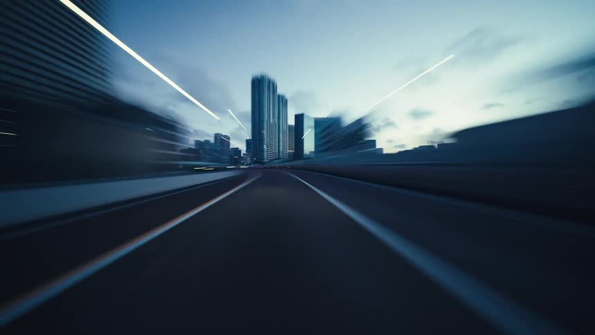 An exhilarating hyperlapse captures a speedy journey through the illuminated highways and tunnels of a modern city at dusk