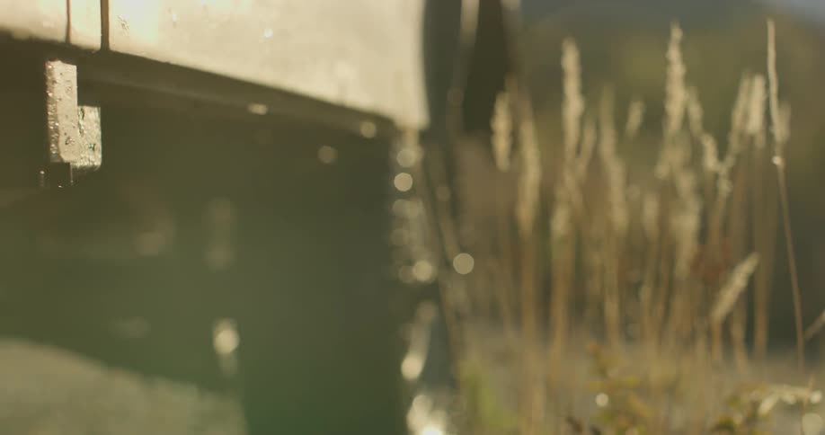 Water slowly drips from a parked truck