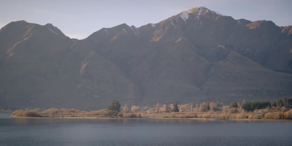 The lake is calm before this mountain