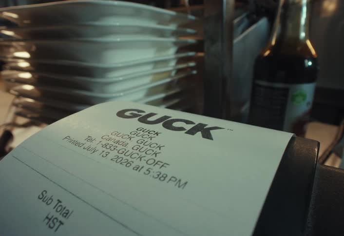 A point-of-sale printer in a restaurant continuously prints a long receipt