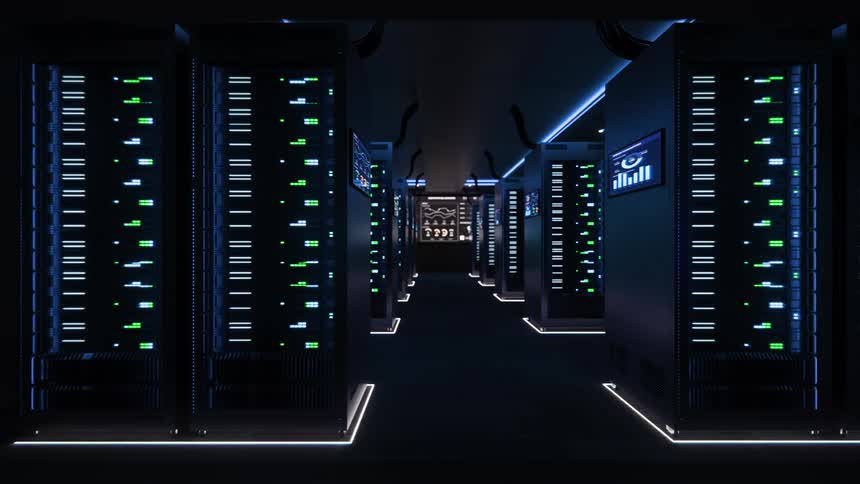 A slow reveal of a futuristic, dark data center with rows of server racks illuminated by glowing green and blue lights