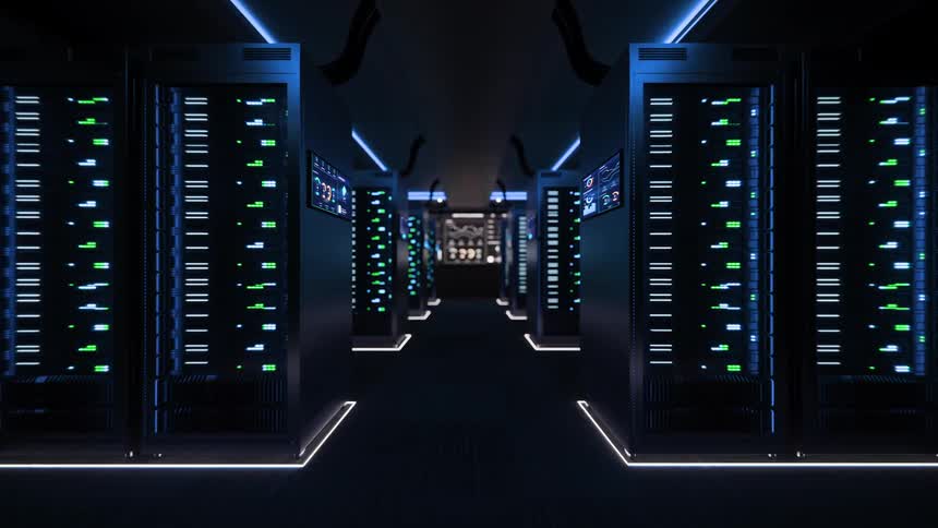 A smooth forward tracking shot through a dark, futuristic server room filled with active data racks and monitoring screens