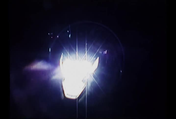 Distorted vintage VHS footage captures the chaotic energy of a motorcycle gang's night ride through the city from a rider's POV