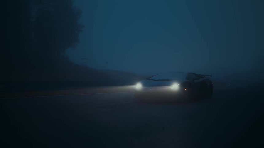 A sleek sports car with bright headlights on cuts through the thick blue fog while driving on a mysterious road at night
