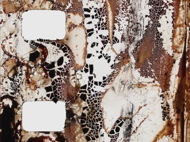 Grungy stop-motion sequence of a damaged and cracking old film strip, perfect for transitions or backgrounds