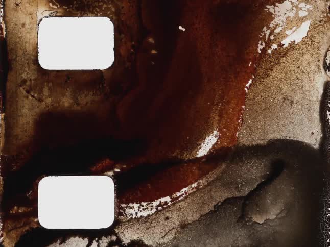 Abstract stop-motion animation of decaying and distorted film strips with grunge textures and sprocket holes