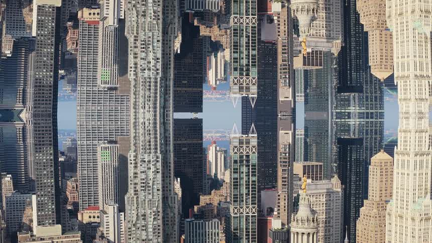A surreal, mind-bending aerial view of a vertically mirrored cityscape slowly zooms out, revealing an abstract urban landscape