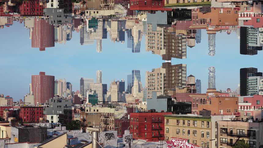 A surreal, mirrored time-lapse of the New York City skyline creates a mind-bending upside-down world