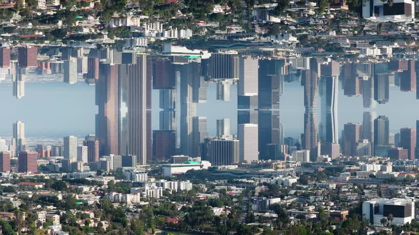 An abstract and surreal mirrored cityscape of Los Angeles creates an otherworldly, inception-style landscape