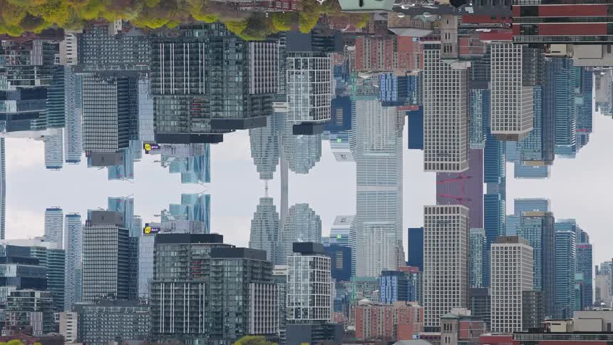 An abstract and surreal mirrored city with an inverted skyline creates a futuristic and dystopian world