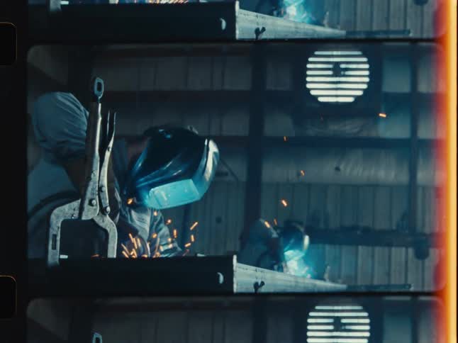 Multi-frame film aesthetic of a skilled welder meticulously joining metal pieces, with bright sparks flying in a workshop