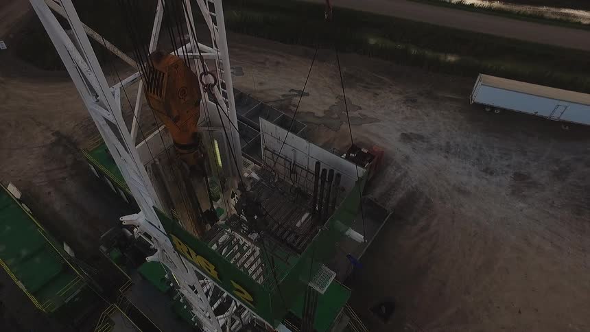 A tower is pulling a metal object up