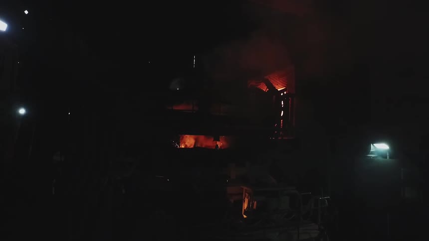 A machine is giving off flames and smoke