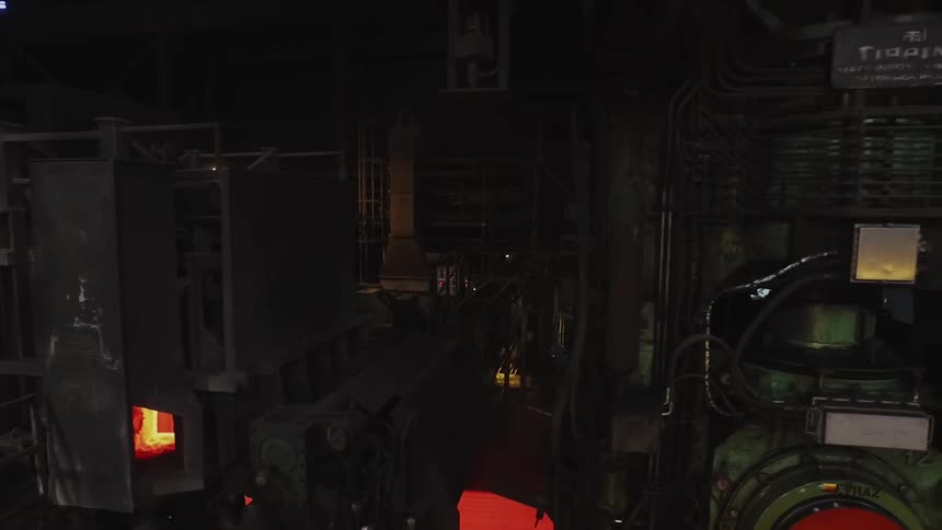 Machinery is shown inside a factory
