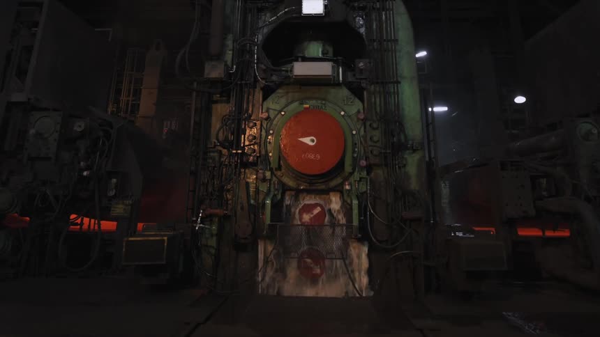 A machine is turning water around wheels