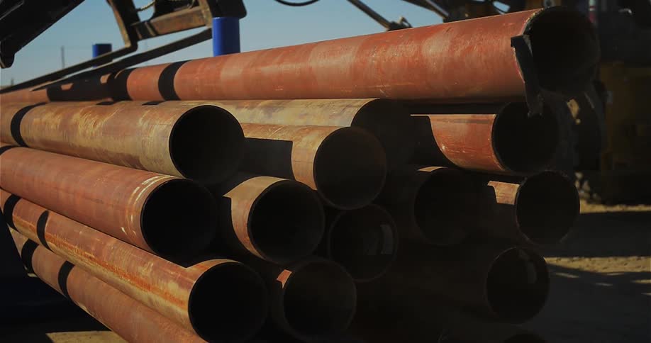 Metal pipes are stacked together