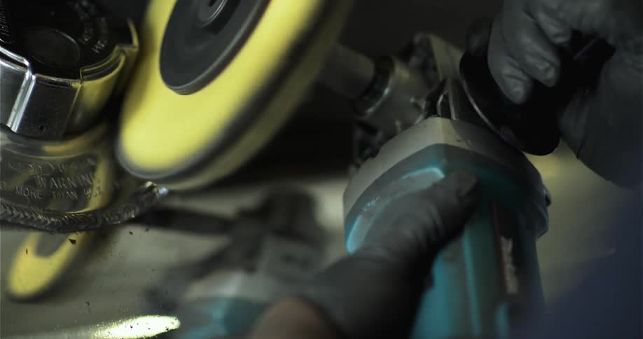 A sander polishes a metal knob
