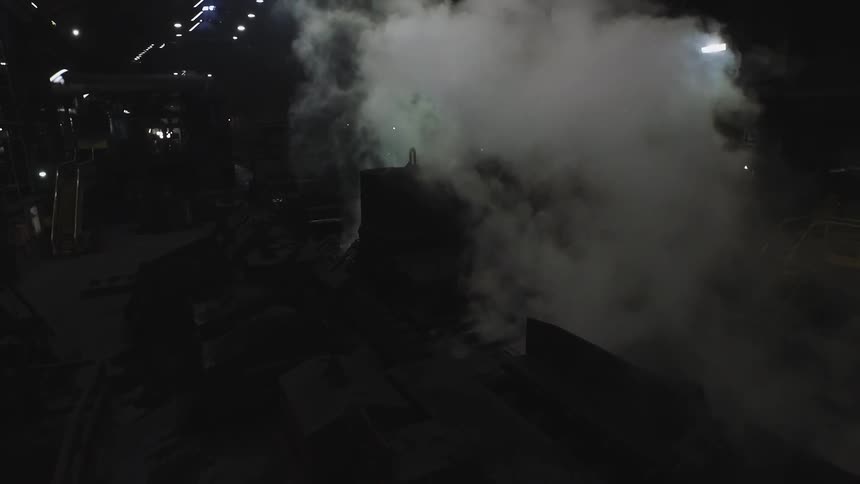 Steam rises from machines