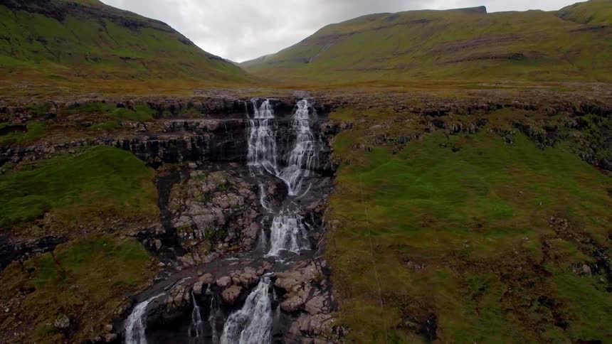 Water pouring down a cliff