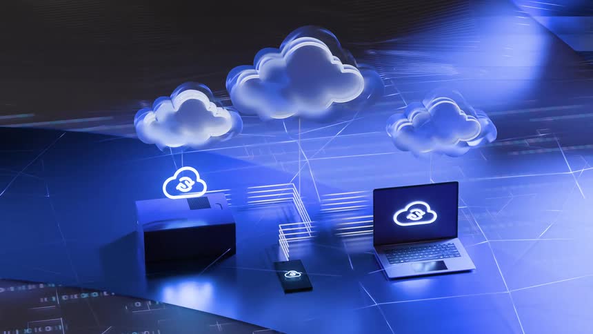 A 3D animation illustrating the concept of cloud computing, showing data synchronization between a server, laptop, and smartphone with a focus on financial technology