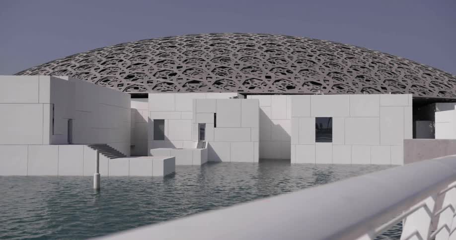 A pool is near a dome