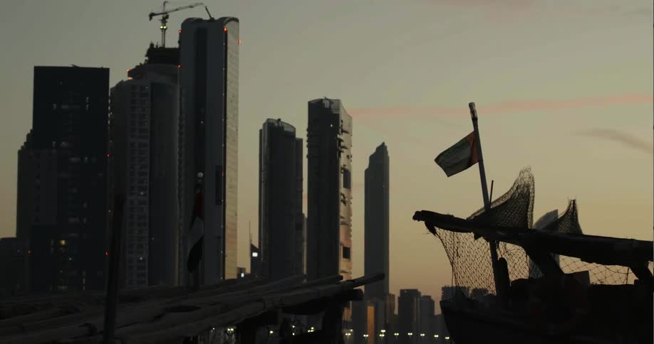 View of tall skyscrapers at sunset