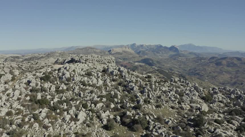 Static aerial view of the unique karst rock formations at El Torcal de Antequera in Andalusia, Spain