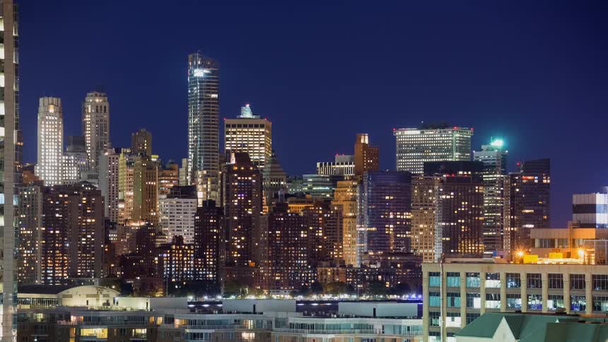 A stunning timelapse of the illuminated New York City skyline as the lights twinkle throughout the night