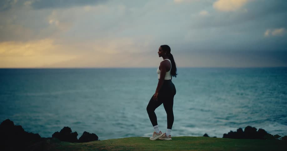Portrait of a beautiful and athletic black woman enjoying the outdoors, representing a health and wellness lifestyle