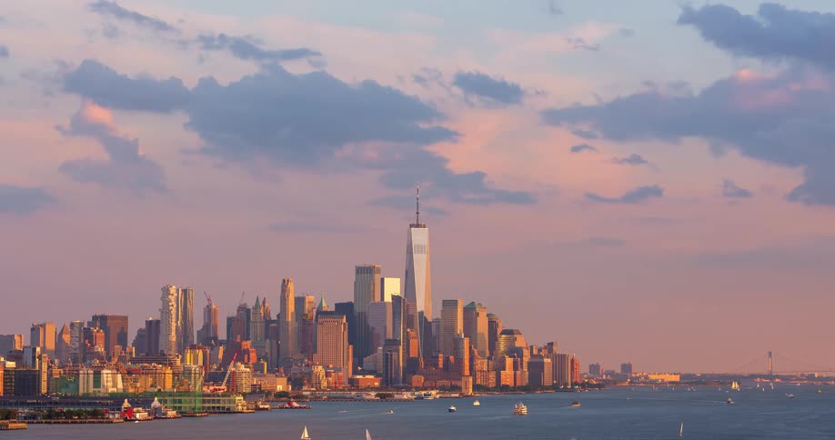 A stunning timelapse of the Lower Manhattan skyline and One World Trade Center at sunset as boats sail along the Hudson River