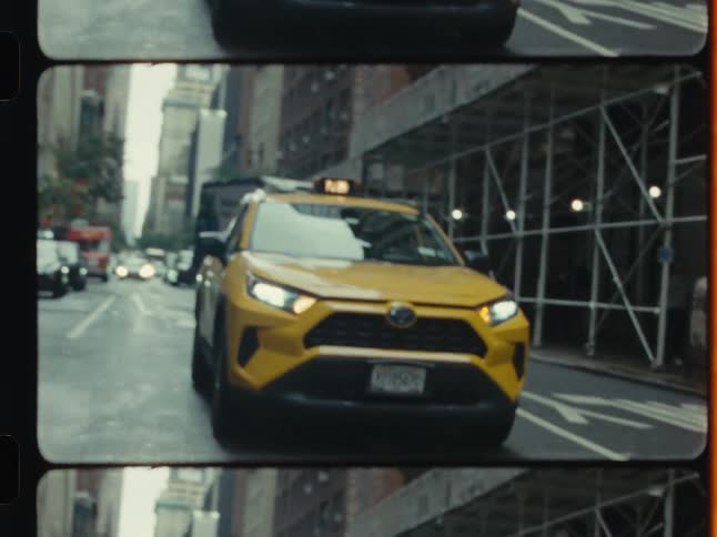 A stylized montage of New York City life on vintage film, featuring a taxi and men walking under scaffolding