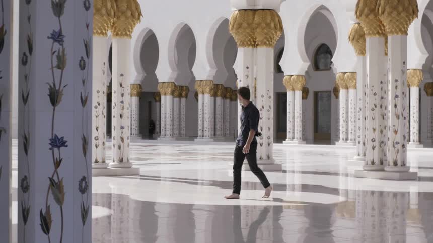 Barefooted man walks through a temple