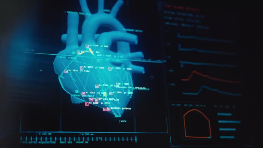 Close-up of a high-tech medical screen showing a detailed cardiogram and vital signs of a human heart