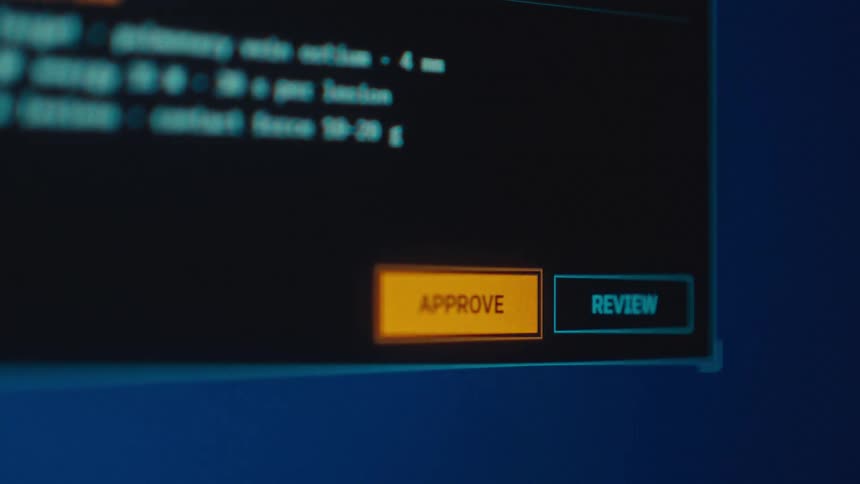 A user on a computer clicks the approve button on a futuristic user interface, initiating a medical procedure