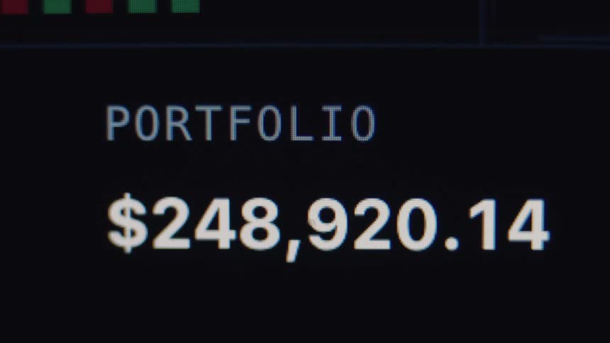 A close-up shot of a digital screen displaying a financial portfolio's value in US dollars