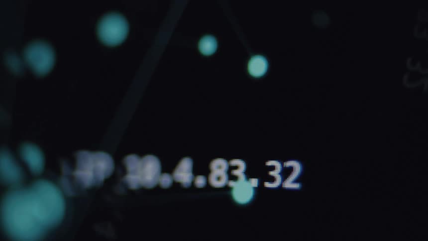 A close-up of a digital screen reveals an IP address over an abstract network visualization