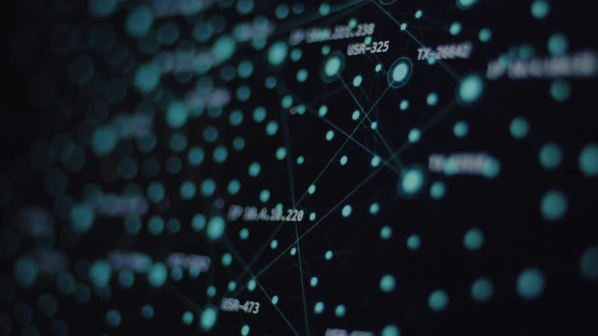 A close-up of a digital screen displays an animated network graph of interconnected nodes with IP addresses, representing data flow or cybersecurity analysis