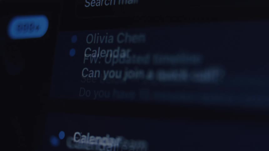 A stressful, close-up view of an overflowing email inbox rapidly scrolling through hundreds of unread work notifications