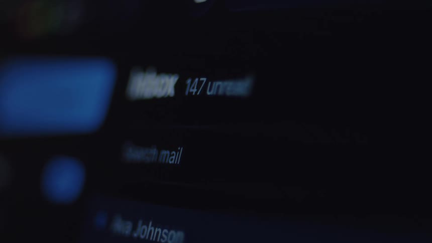 A time-lapse close-up of an email inbox shows the number of unread messages quickly climbing, symbolizing digital overload