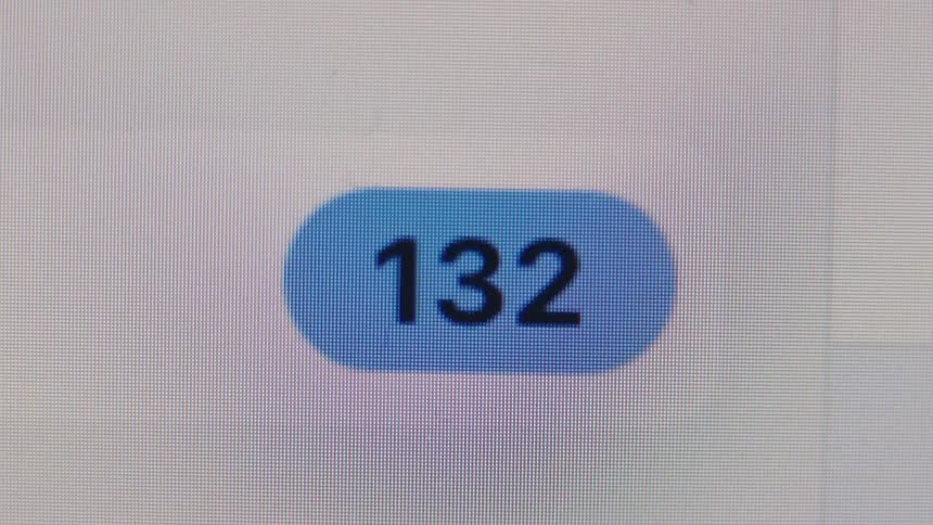 A close-up of a digital notification counter on a computer screen rapidly increasing