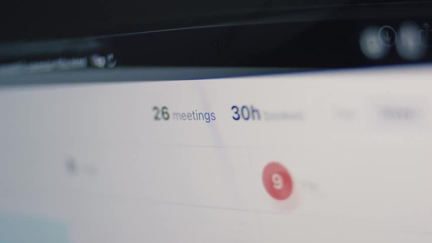An animated counter on a digital calendar shows the number of scheduled meetings and hours rapidly increasing