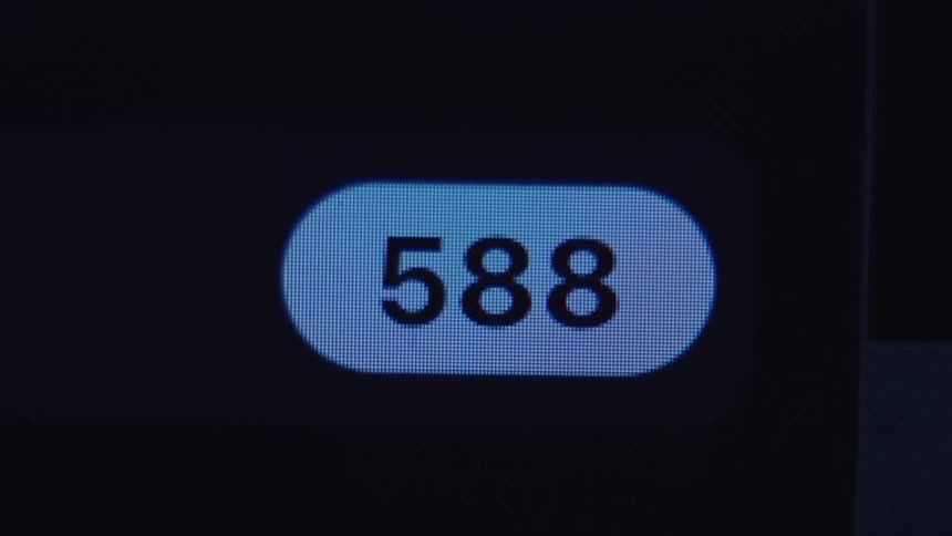 A close-up of a social media notification counter rapidly increasing to over 999, symbolizing viral content and high engagement